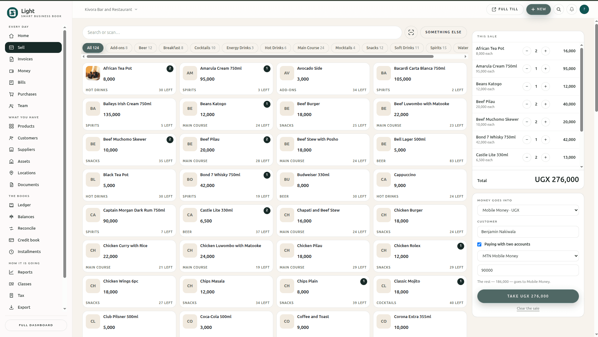 The till, showing the product grid, a running sale and a split payment